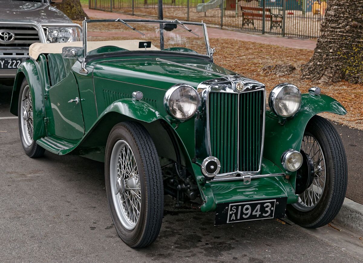 1945-1950 MG TC Midget. I much prefer the style of...