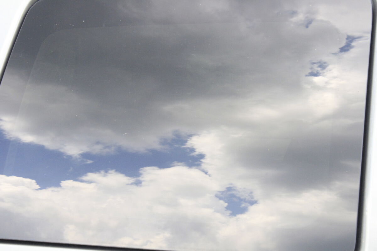 Clouds in a car window....