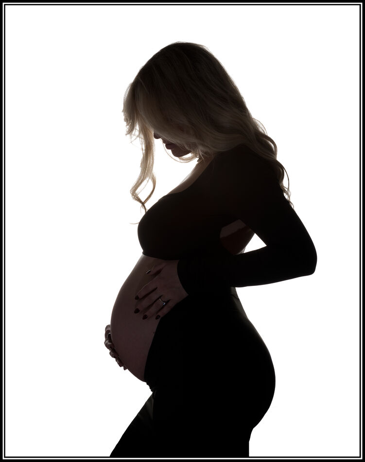Silhouette of an Agency Fashion Model on Maternity...