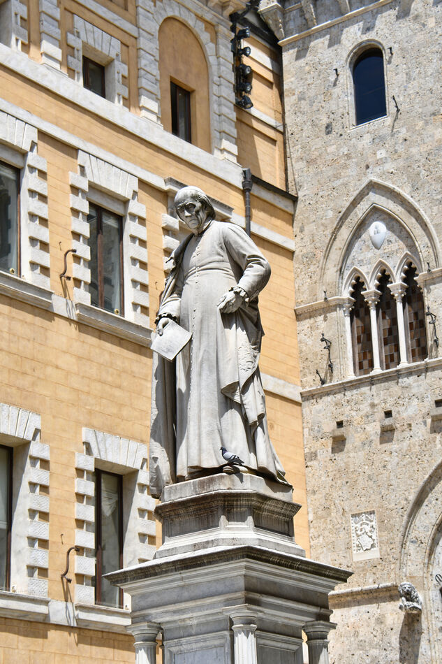 Statue of Sallisto Bandini in front of Banca Monte...