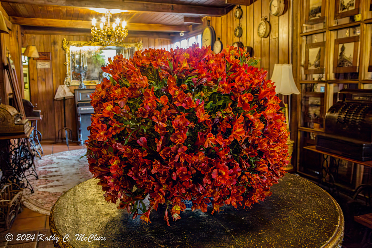 The interior is full of flower arrangements of all...