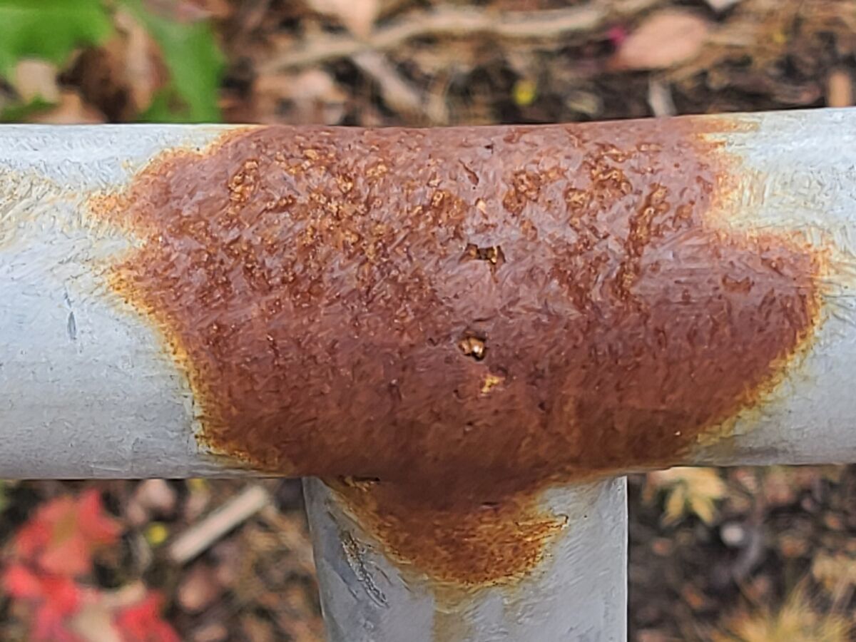 Rusted spot on a handrail....