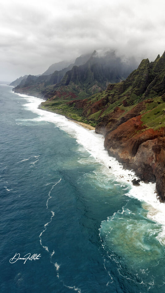 The Na Pali Coast line from the Jack Harter Helico...