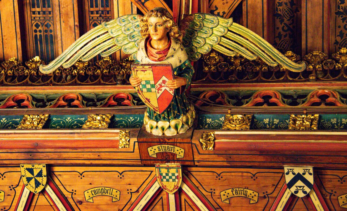 Heraldry and an angel on the Banqueting Hall ceili...