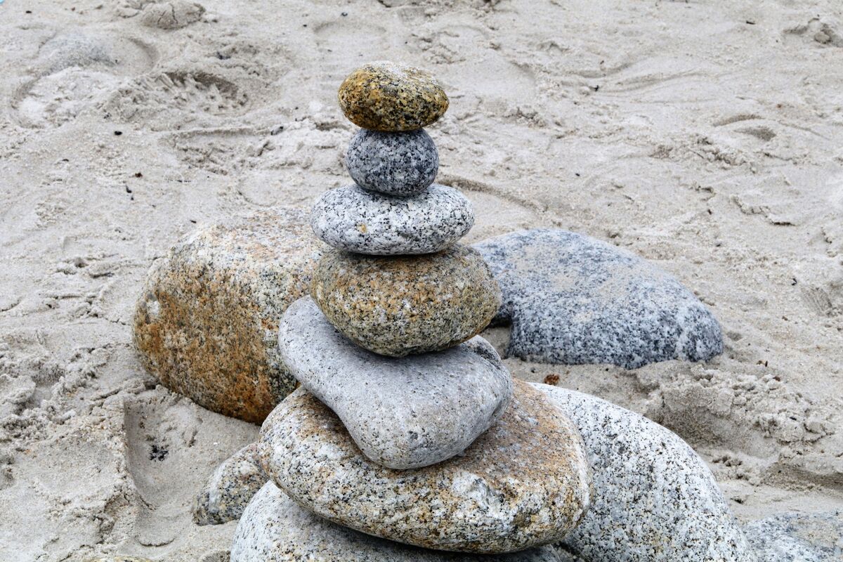Stoacked Rocks Stacked Rocks: Stacked rocks spiritually represent balance, mindfulness ...